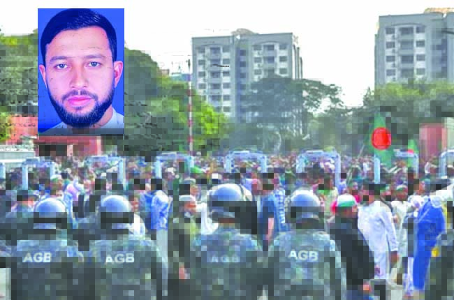 නාඳු­නන තුව­ක්කු­ක­රු­වකු බංග්ලා­දේ­ශ සිසු අර­ගලයේ                         තවත් නාය­ක­ය­කුට වෙඩි තබයි